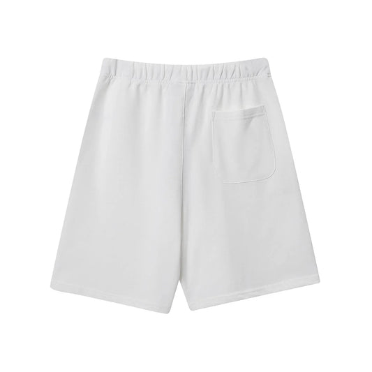 Fear of God Essentials eggshell fleece shorts with tonal logo and relaxed silhouette