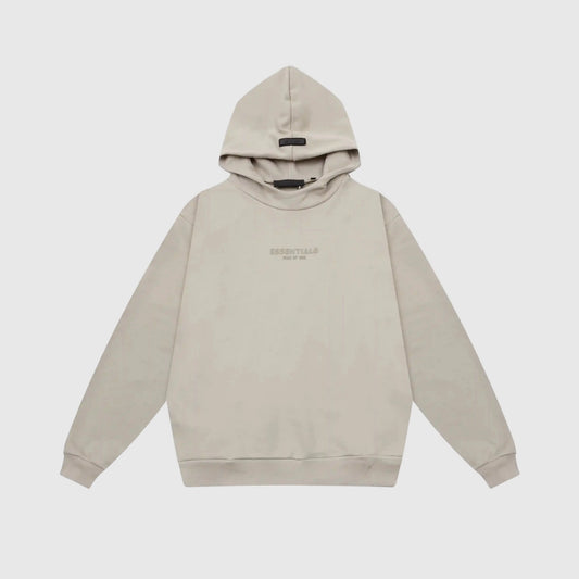 Fear of God Essentials cement hoodie front view with rubberized black bar branding