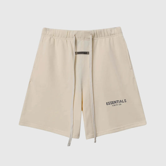 Fear of God Essentials light cream fleece shorts with tonal branding and relaxed silhouette