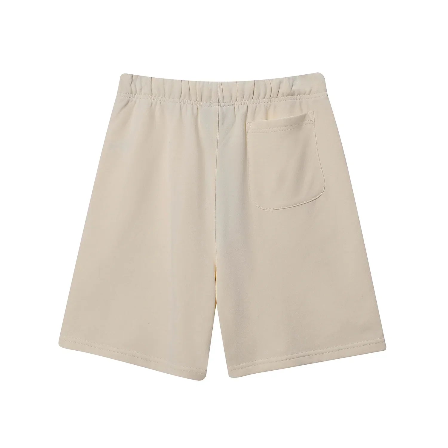 Fear of God Essentials light cream fleece shorts with tonal branding and relaxed silhouette