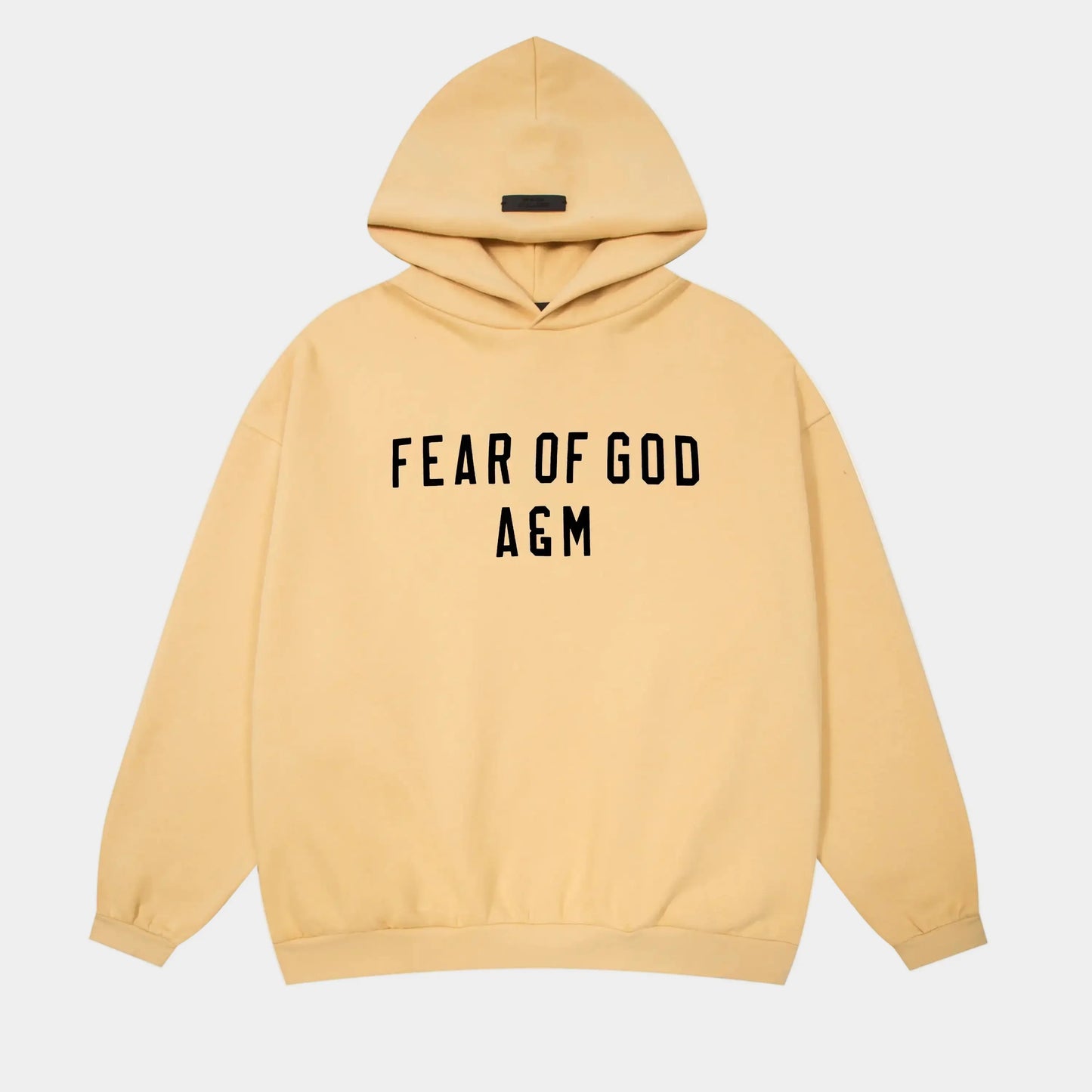 Fear of God Essentials Garden Yellow hoodie front view with rubberized black bar branding