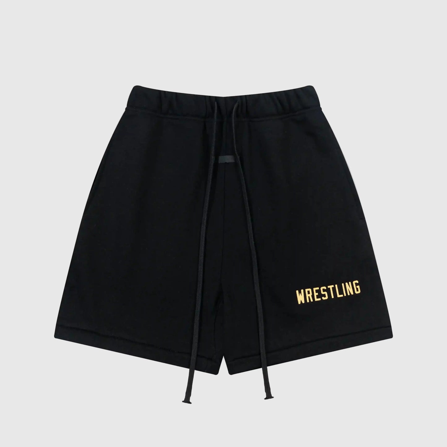 Fear of God Essentials black fleece shorts with tonal branding and long drawcords