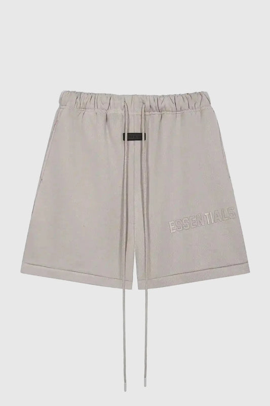Fear of God Essentials dark heather oatmeal fleece shorts with tonal branding and relaxed streetwear fit