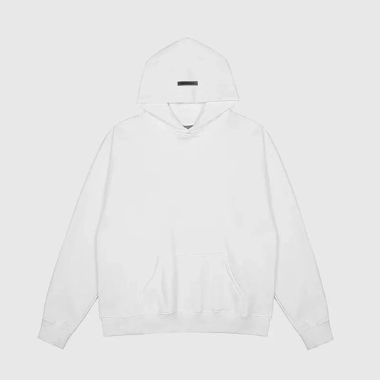 Fear of God Essentials white hoodie front view relaxed fit streetwear