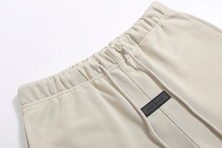 Essentials Cloud Dance shorts tonal rubberized logo leg detail