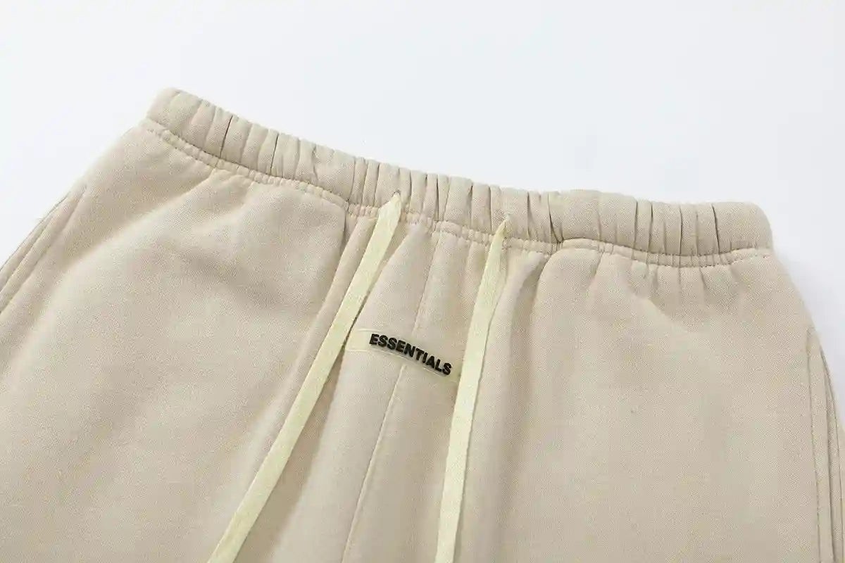 Cozy fleece fabric detail on light cream sweatpants by Fear of God