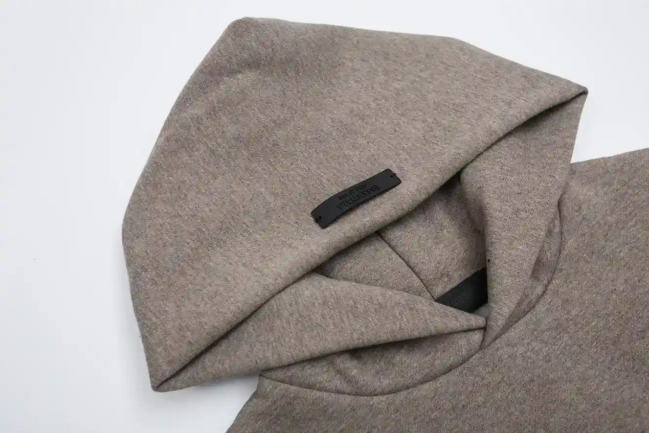 Essentials Almond Frost hoodie branding detail close-up