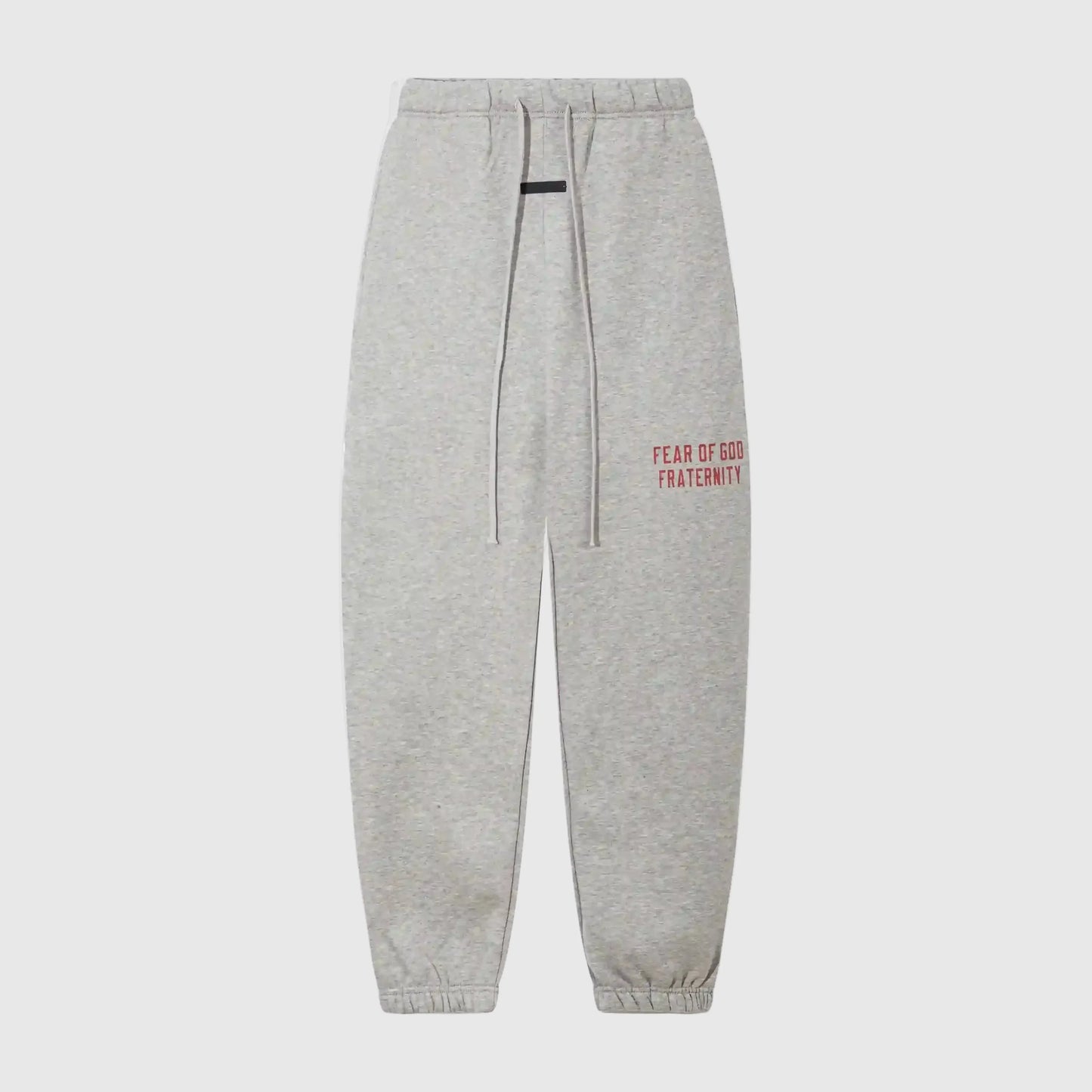 Essentials light heather oatmeal core fleece sweatpants by Fear of God front view
