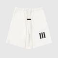back view of Essentials hampton yellow cotton shorts by Fear of God
