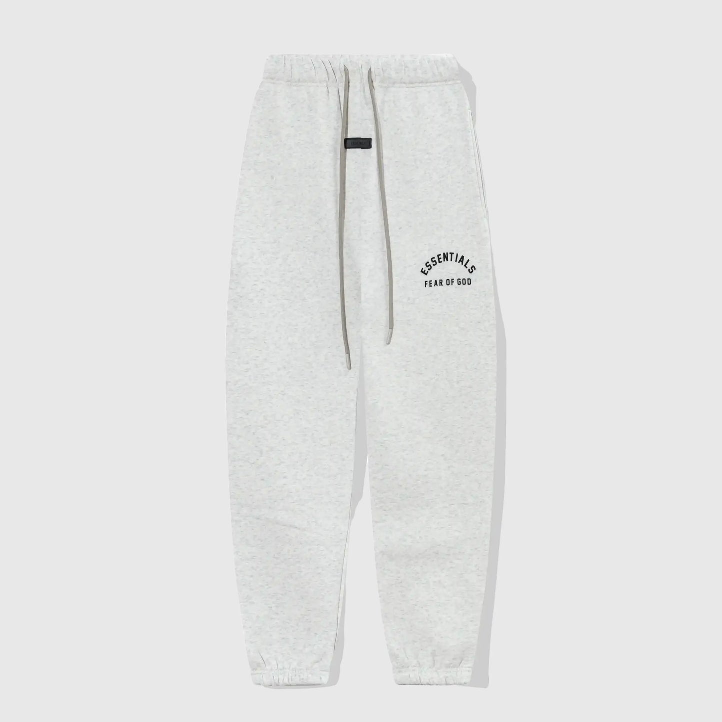 Essentials light heather oatmeal core fleece sweatpants front view by Fear Of God