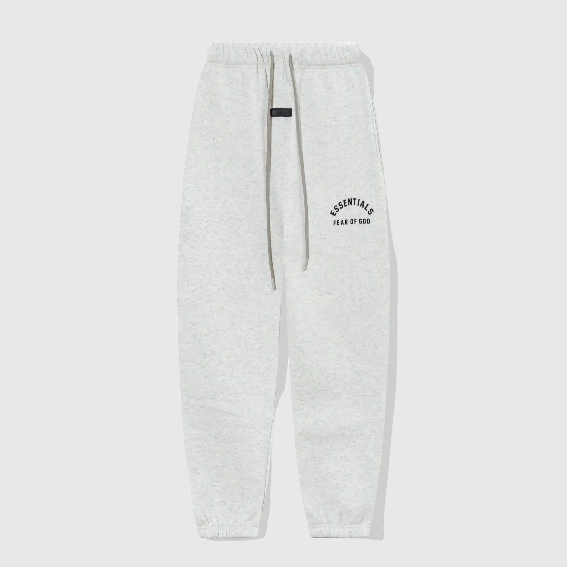 Essentials light heather oatmeal core fleece sweatpants front view by Fear Of God