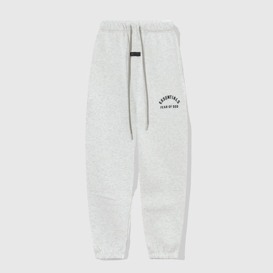 Essentials light heather oatmeal core fleece sweatpants front view by Fear Of God
