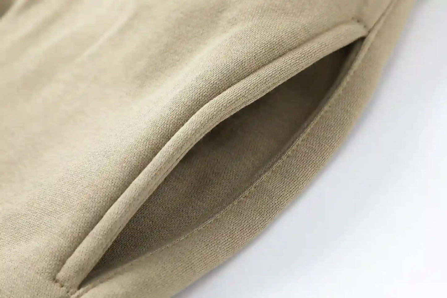 Jogger style beige sweatpants with elastic waistband by Fear Of God