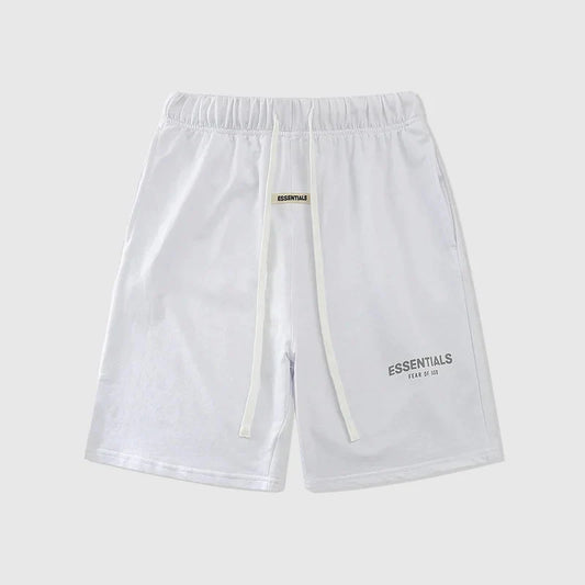 Fear of God Essentials fleece shorts in eggshell white with tonal branding and relaxed fit