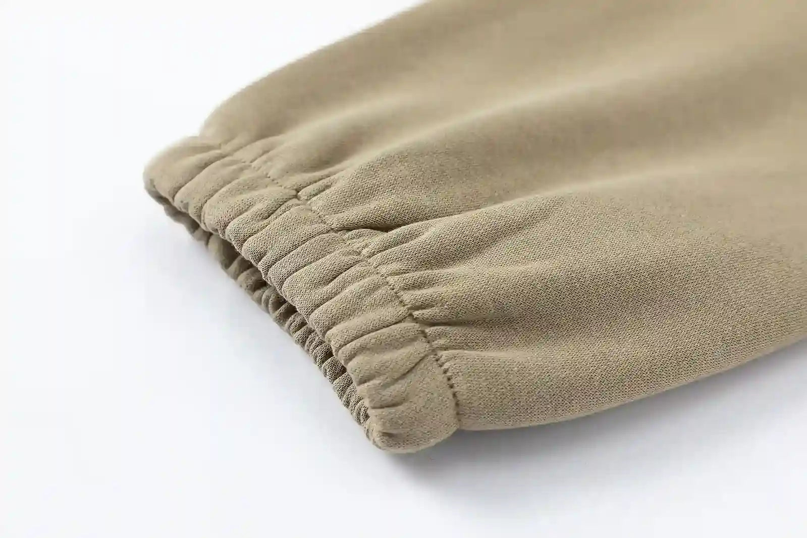 Ribbed ankle cuffs and side pocket detail on sweatpants by Fear Of God