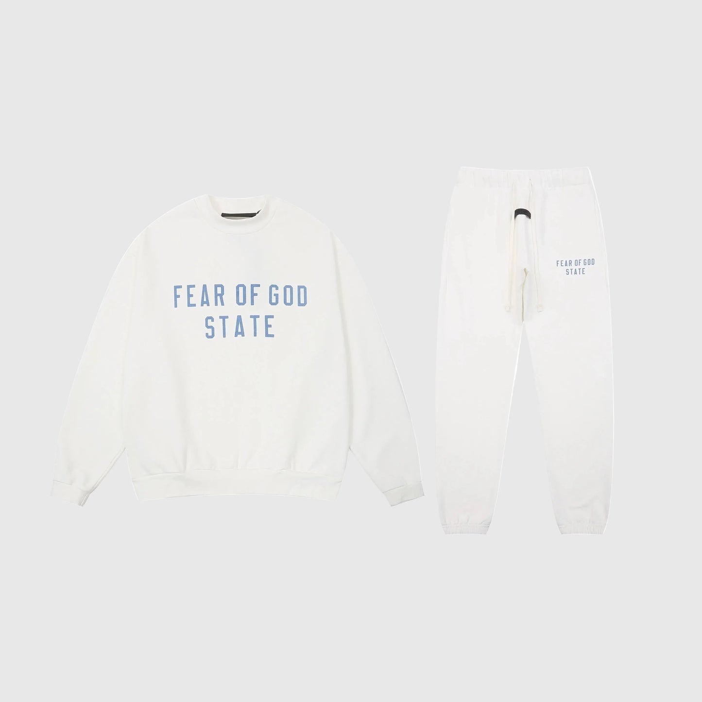 Essentials cloud dance cozy fleece tracksuit set with relaxed fit by Fear Of God