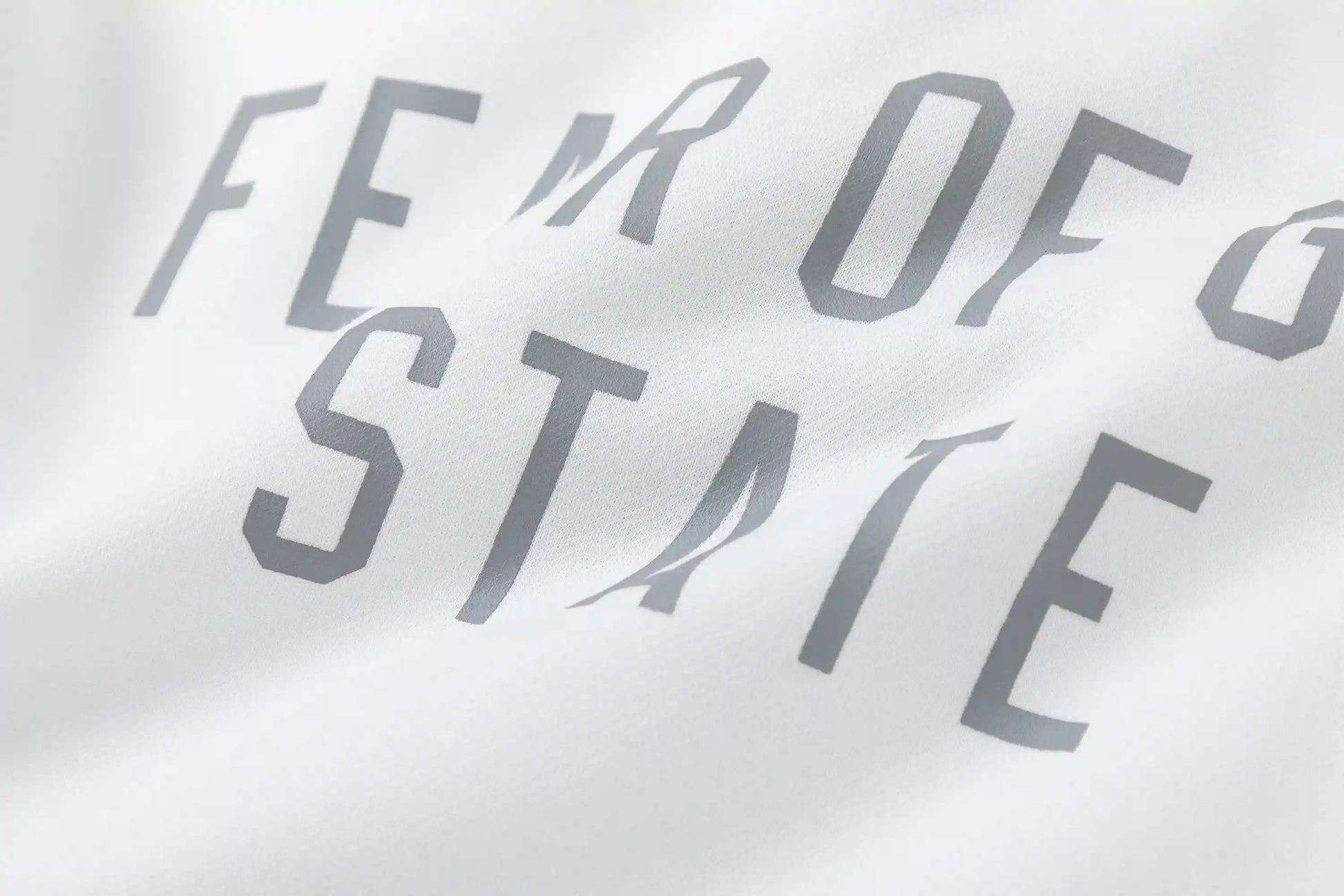 Fear of God Essentials Cloud Dance hoodie hood label detail