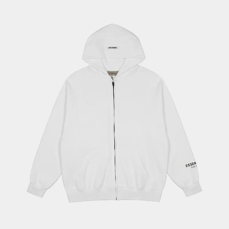 Fear of God Essentials white zip fleece hoodie front view with rubberized Black Bar branding