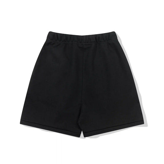 Fear of God Essentials black fleece shorts with tonal branding and long drawcords