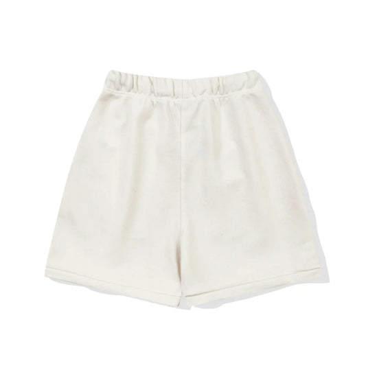 Essentials denim blue everyday shorts by Fear of God logo detail