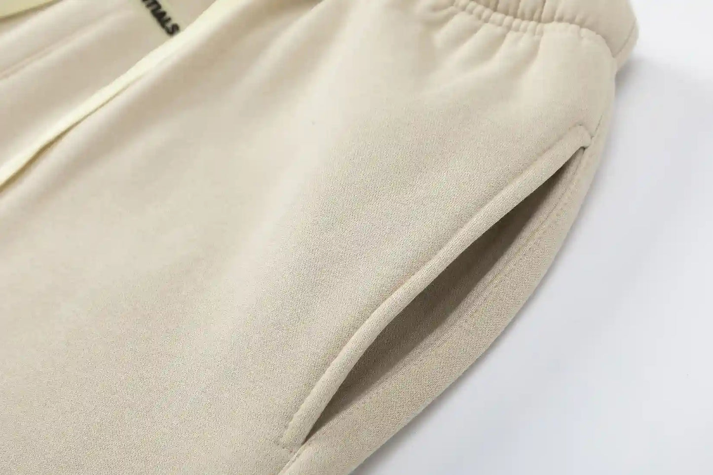 Essentials casual streetwear light cream sweatpants by Fear of God outfit