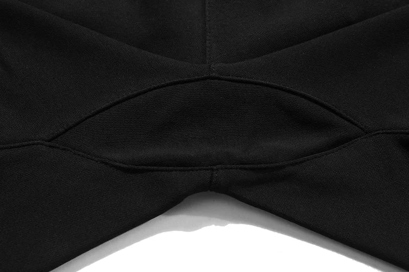 Fear of God Essentials black fleece shorts with tonal branding and relaxed streetwear fit