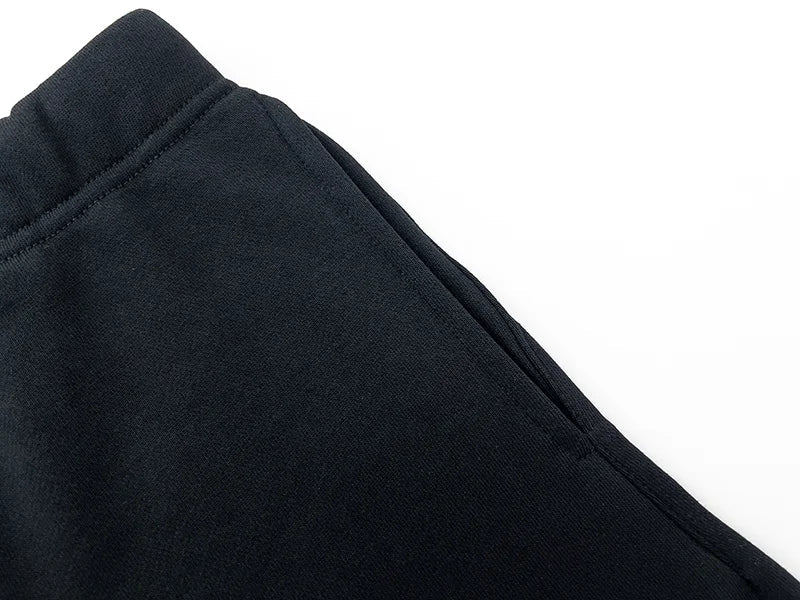 detail view of Essentials ink fleece shorts by Fear of God