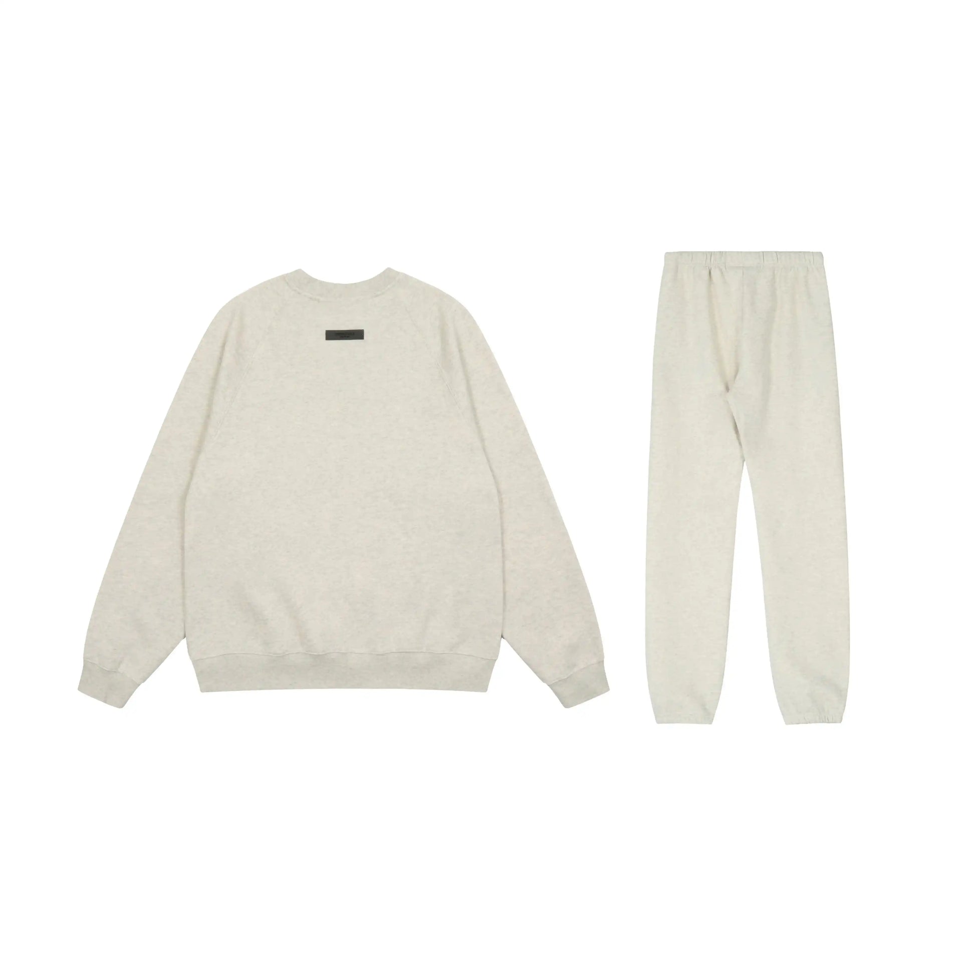 Essentials tracksuit cloud dance angled view relaxed fit crewneck set