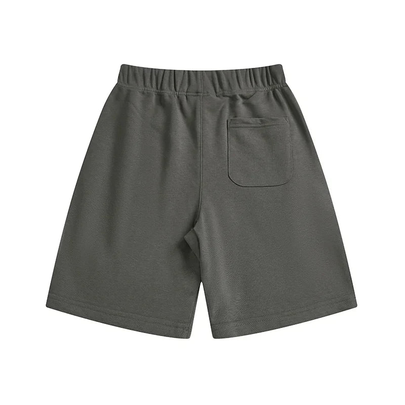 Fear of God Essentials heather grey fleece shorts with tonal branding and long drawstrings