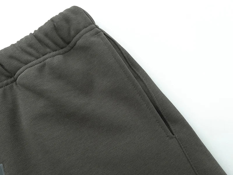 Fear of God Essentials heather grey fleece shorts with tonal branding and long drawstrings