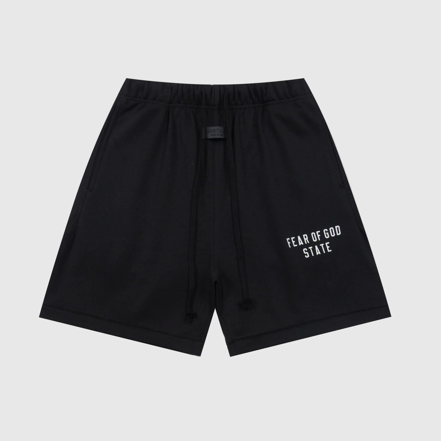 Fear of God Essentials black fleece shorts with tonal logo and drawstring waistband