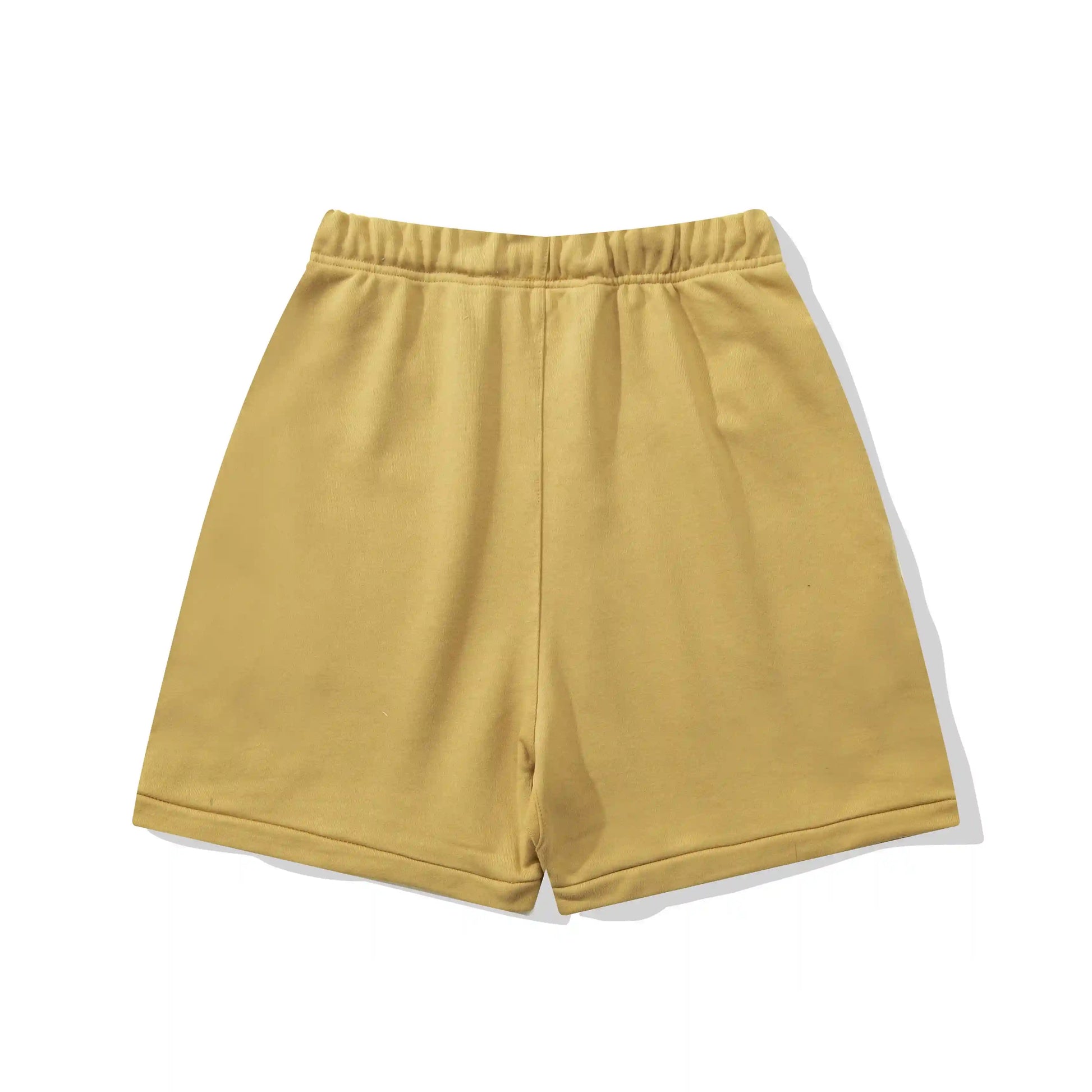 Fear of God Essentials Garden Yellow fleece shorts relaxed fit side view
