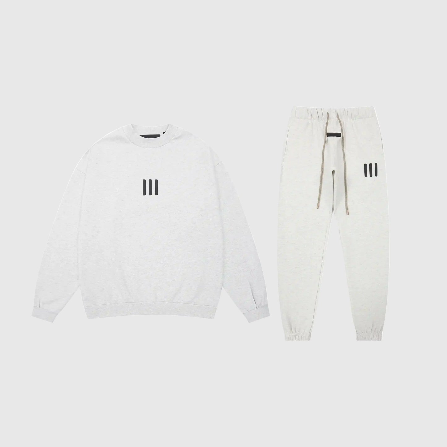 Essentials Cloud Dance core fleece tracksuit front view by Fear Of God