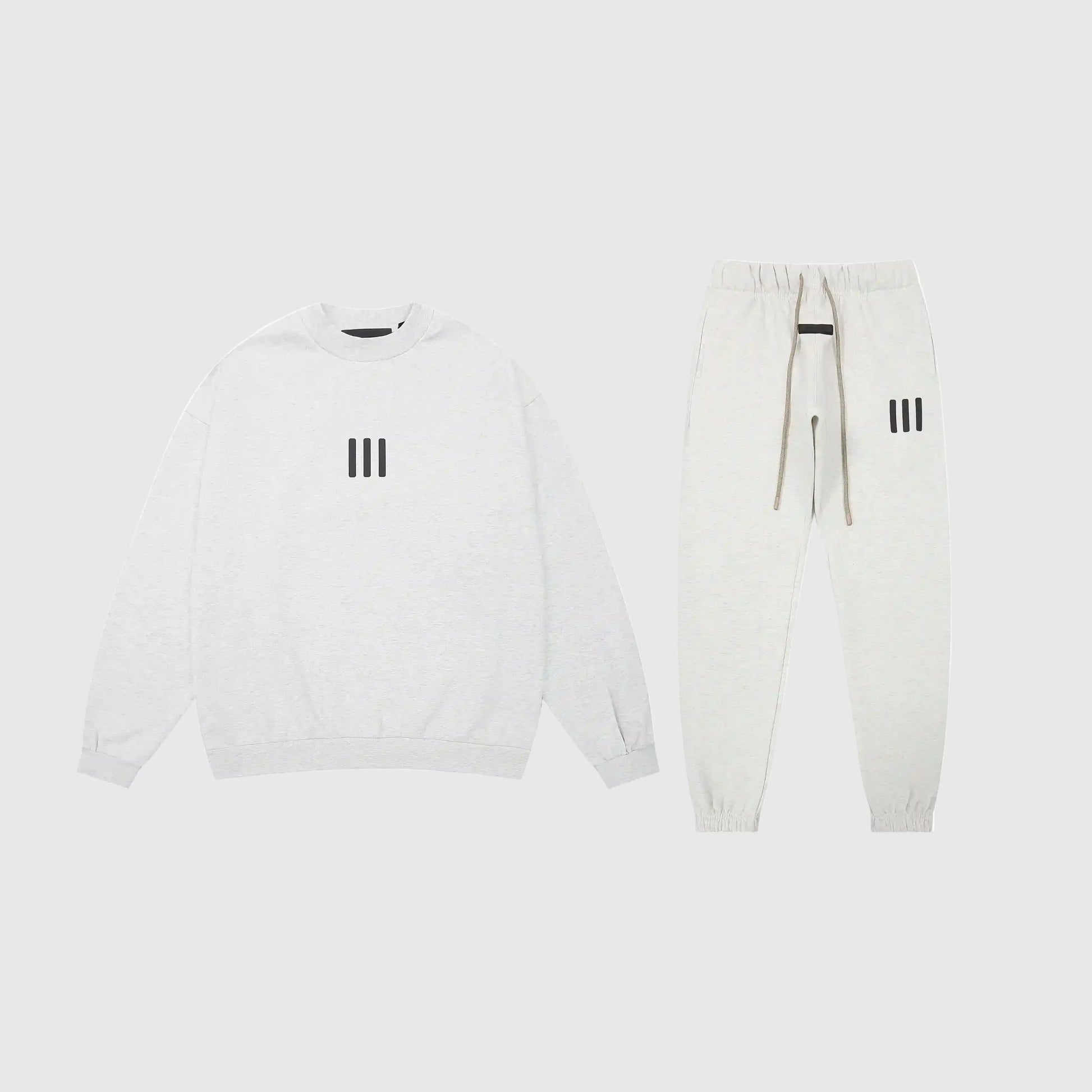 Essentials Cloud Dance core fleece tracksuit front view by Fear Of God