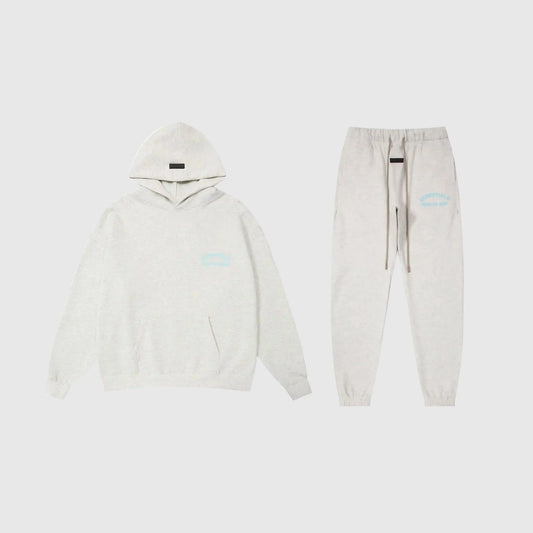 Essentials eggshell fleece tracksuit set with relaxed fit by Fear Of God