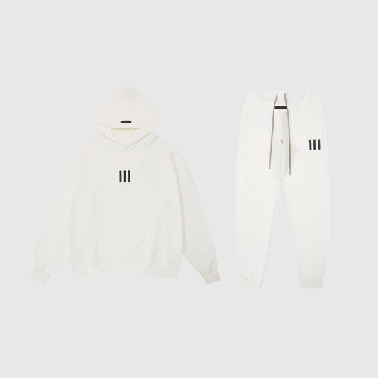 Fear of God Essentials eggshell tracksuit front view hoodie and joggers