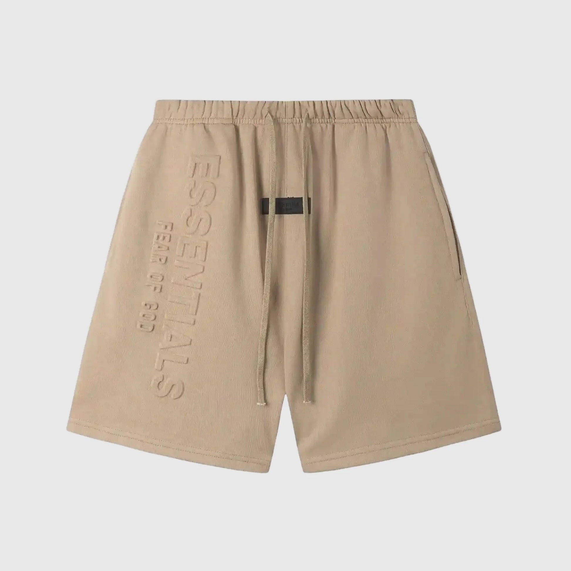 Fear of God Essentials Calm Shell shorts in beige with drawstring waist and tonal branding