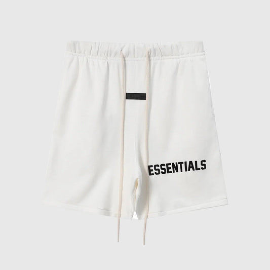 side view of Essentials light cream casual shorts by Fear of God

