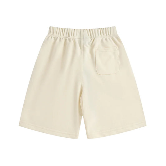 Fear of God Essentials Cloud Dance fleece shorts in off-white with tonal branding and relaxed fit