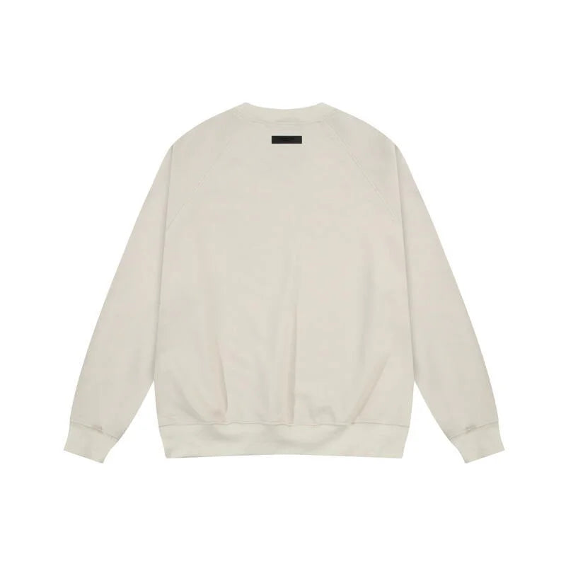 Design details of Essentials cloud dance daily comfort fleece tracksuit by Fear Of God