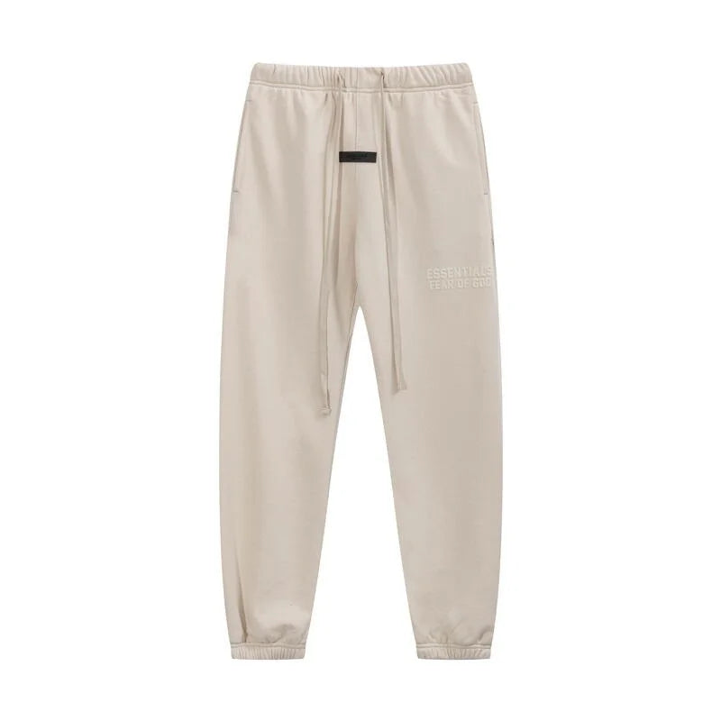 Back view of Essentials cloud dance daily comfort fleece tracksuit set by Fear Of God