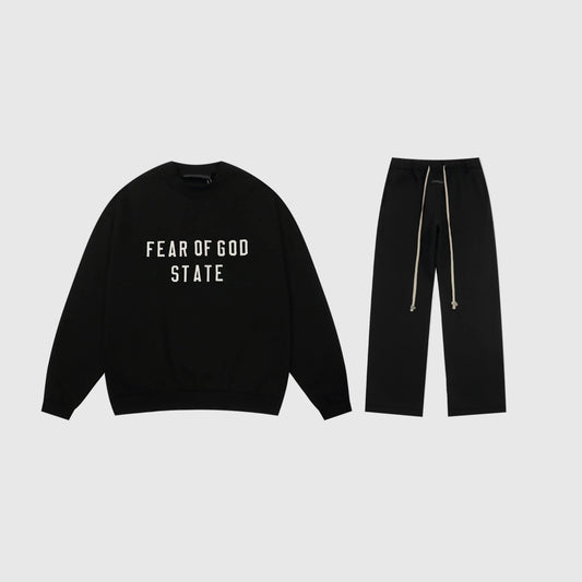 Essentials black minimal fleece tracksuit set with relaxed fit by Fear Of God