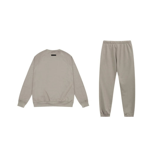 Essentials heathered grey elevated fleece hoodie with soft interior detail by Fear Of God