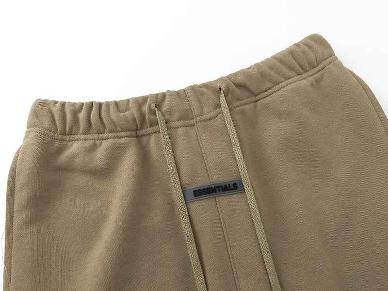 Fear of God Essentials dark beige fleece shorts with relaxed fit and tonal logo