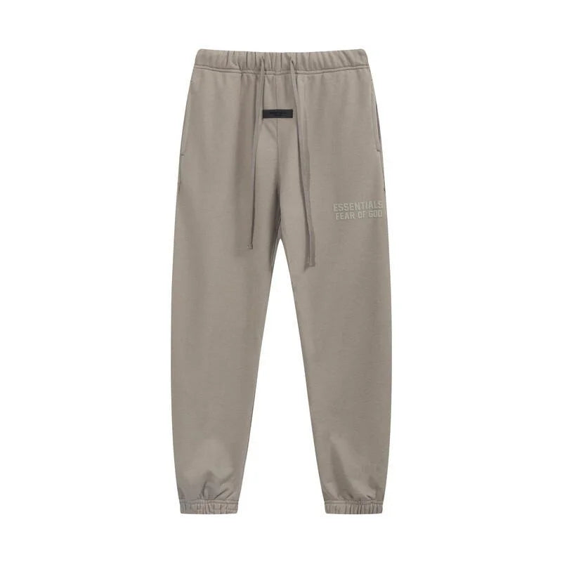 Back view of Essentials heathered grey elevated fleece tracksuit set by Fear Of God

