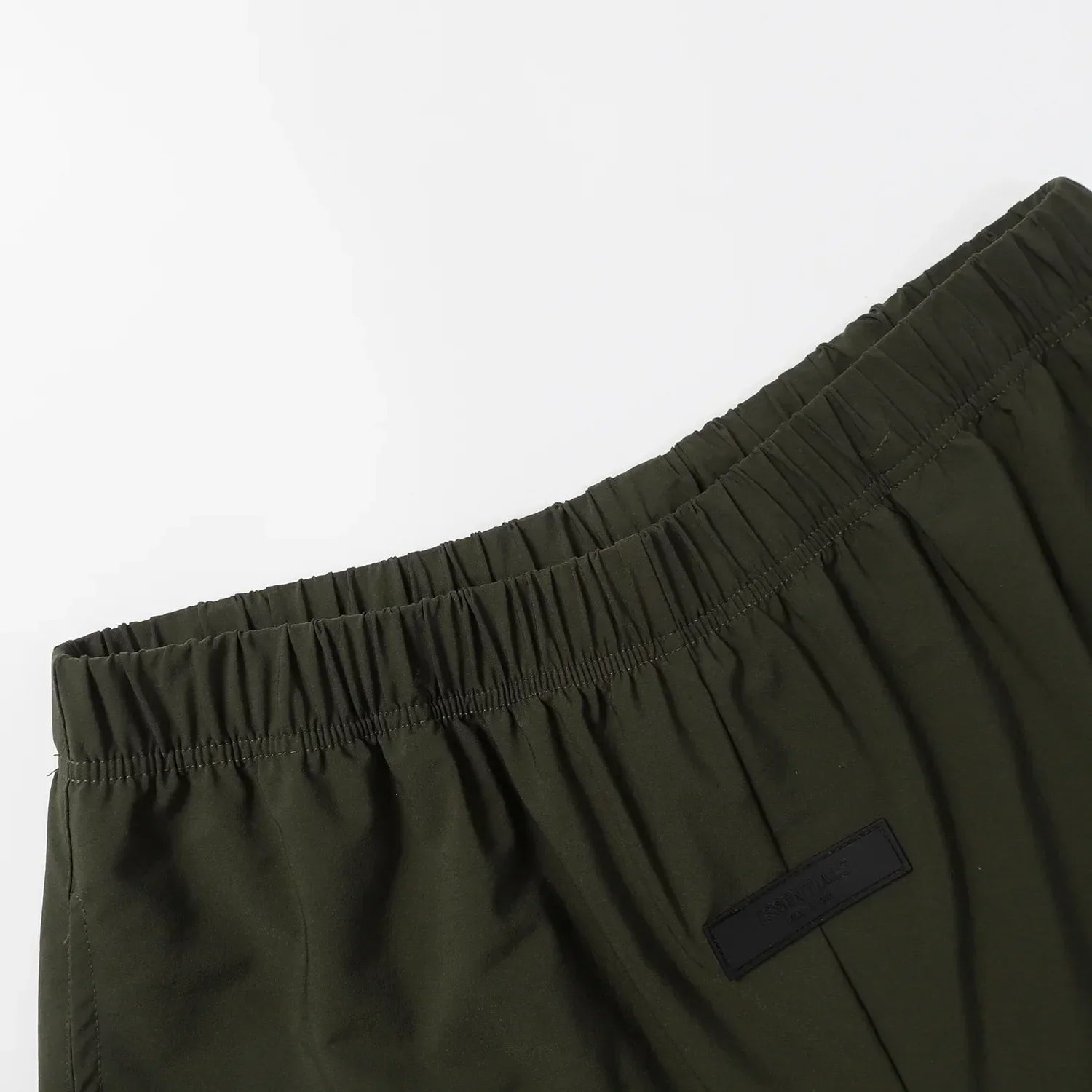 Fear of God Essentials Hemlock green fleece shorts with tonal logo and drawstring waistband