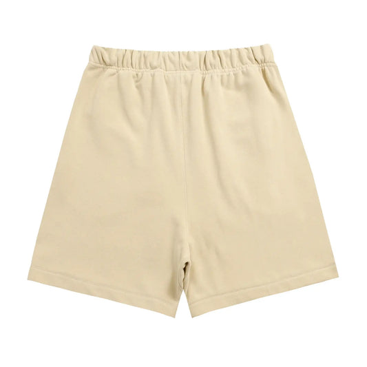 Fear of God Essentials Calm Shell Shorts in beige fleece with drawstring waistband