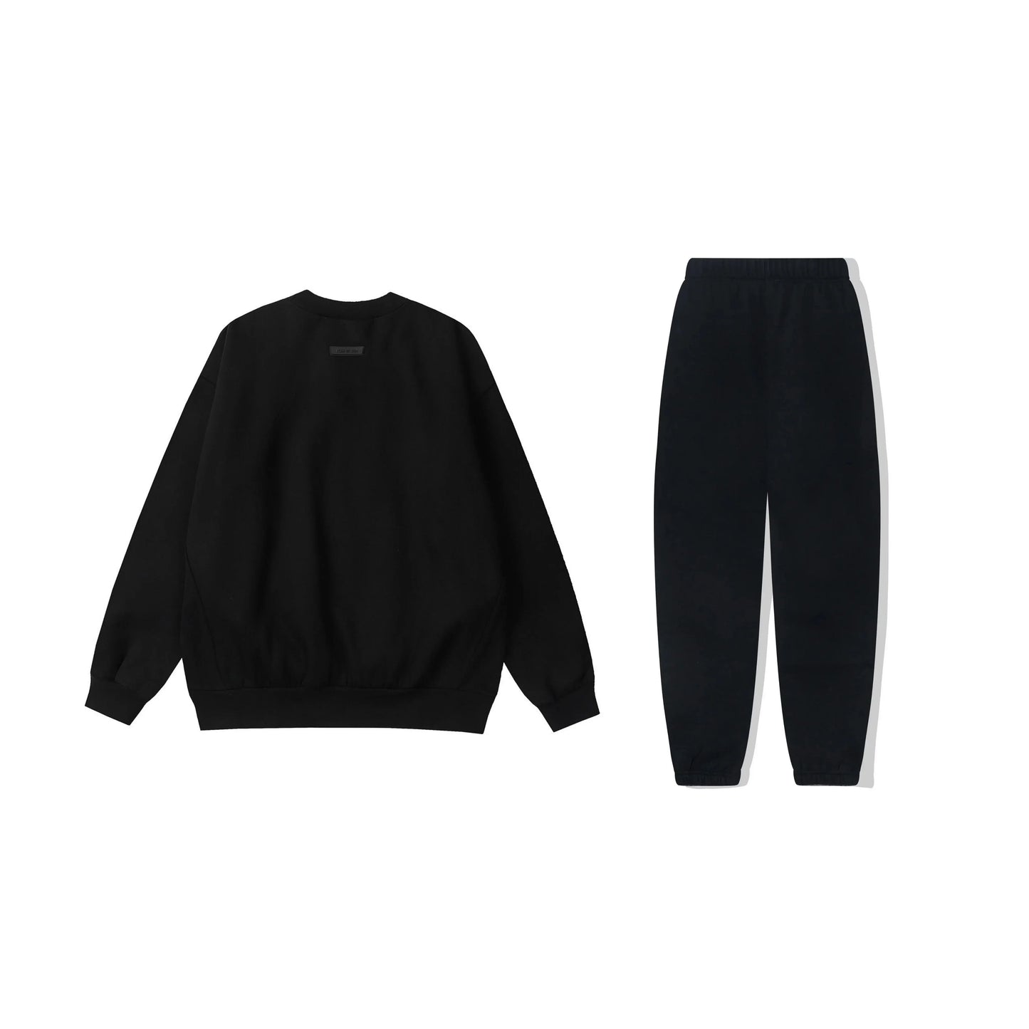 essentials black hoodie and tracksuit pants casual outfit by Fear Of God