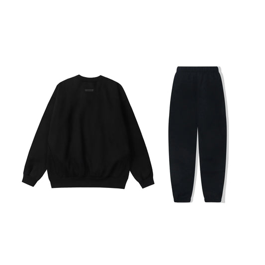 essentials black hoodie and tracksuit pants casual outfit by Fear Of God