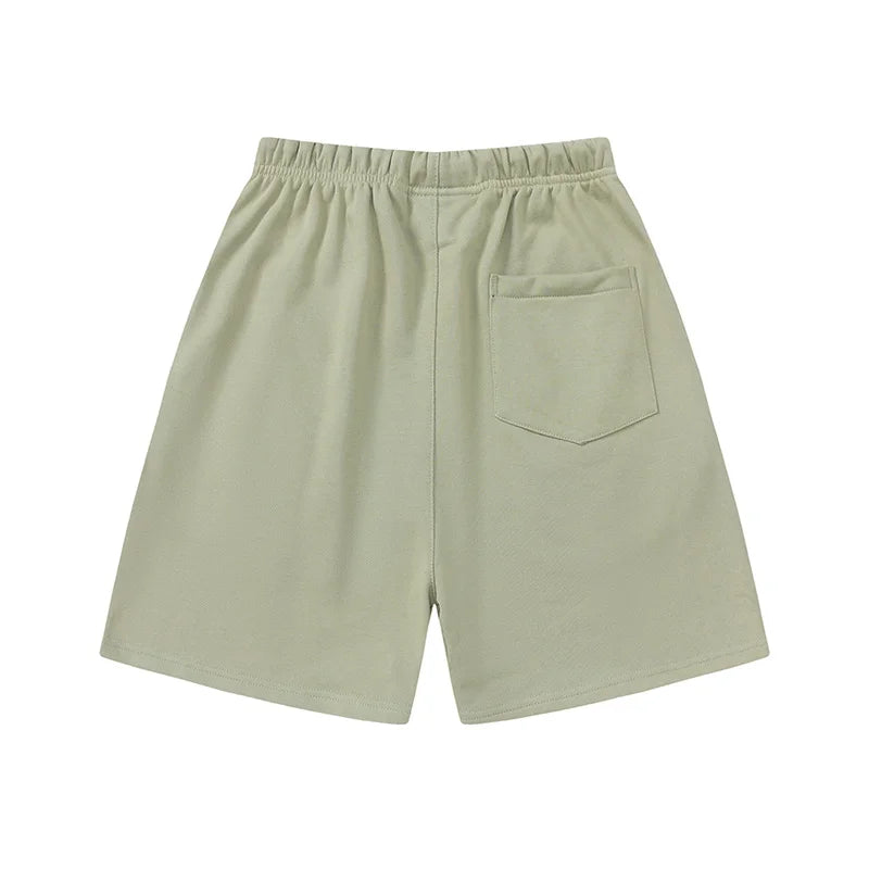 Fear of God Essentials Pavlova fleece shorts in beige with tonal logo and drawstrings